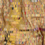 undulating golden quilt of bottle top wrappers.